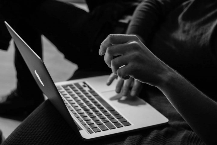 person using laptop