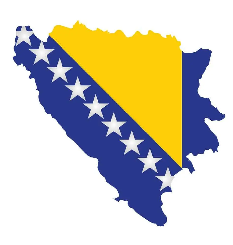 An outline of Bosnia and Herzegovina colored with its national flag: a diagonal yellow triangle and blue background with white stars along the diagonal.