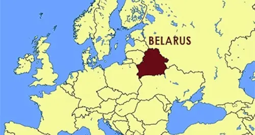 A map of Europe highlighting Belarus in dark brown, with BELARUS labeled in bold text. Surrounding countries and bodies of water are shown in yellow and blue, respectively.