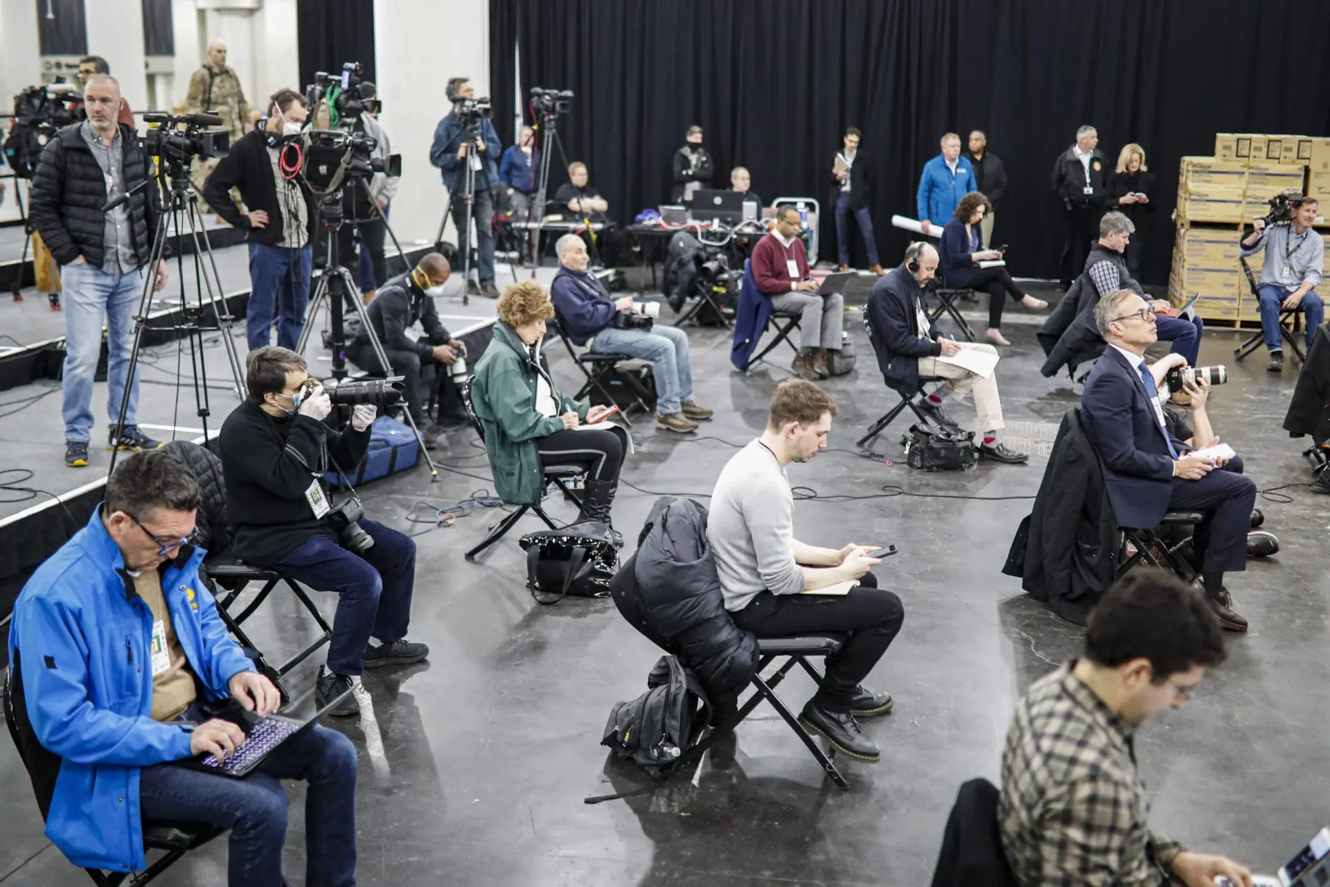 Journalists seated, socially distanced at the Jacob Javits Center