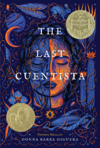Book cover of The Last Cuentista by Donna Barba Higuera, featuring an illustrated face split between blue and orange tones, surrounded by celestial and nature imagery. Includes nods to the story explored in a Donna Barba Higuera interview. Two award medals are shown.