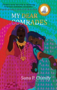 Book cover for My Dear Comrades by Sunu P. Chandy, featuring two women in colorful, patterned attire sitting close together; one leans on the others shoulder. Includes a gold poetry award seal and recalls moments from a Sunu Chandy interview.