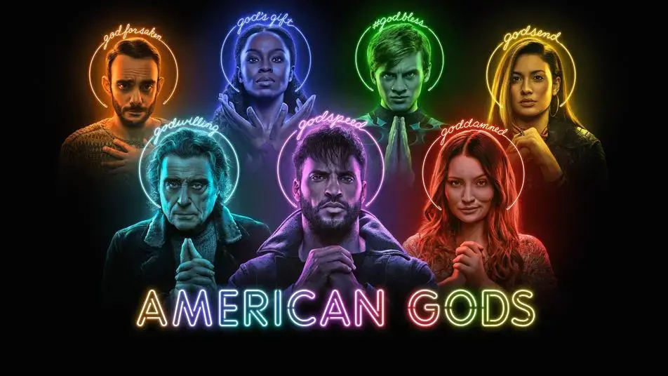 Seven characters from American Gods, a standout in the world of banned book movies, pose with neon halo-like circles and glowing words above their heads, hands clasped against a dark background. The show’s title gleams at the bottom.