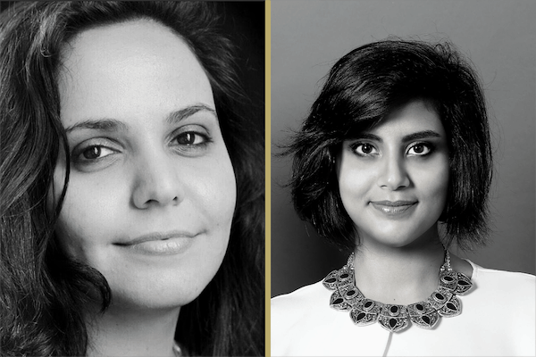Two women in black and white portraits side by side; the woman on the left has long wavy hair and a slight smile, while the woman on the right, wearing a decorative necklace, both face the camera—recipients of the 2019 Freedom to Write Award.
