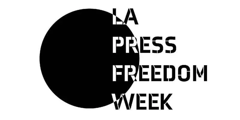 Logo for LA Press Freedom Week featuring a large, solid black circle on the left and the event name in bold, stencil-style black text arranged vertically on the right.