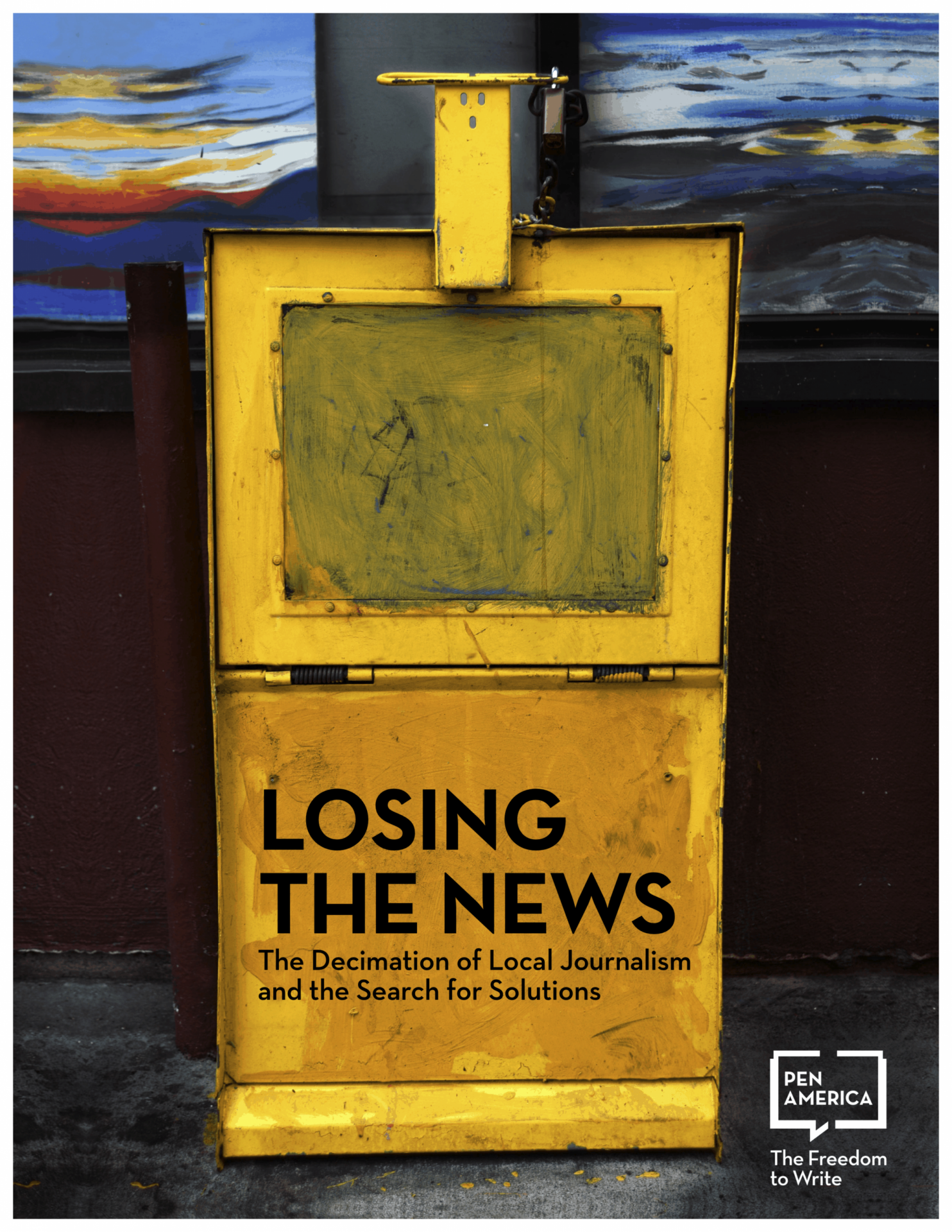 A weathered, yellow newspaper vending box stands closed against a mural backdrop. Black text on the box reads, Losing the News: The Decimation of Local Journalism and the Search for Solutions.