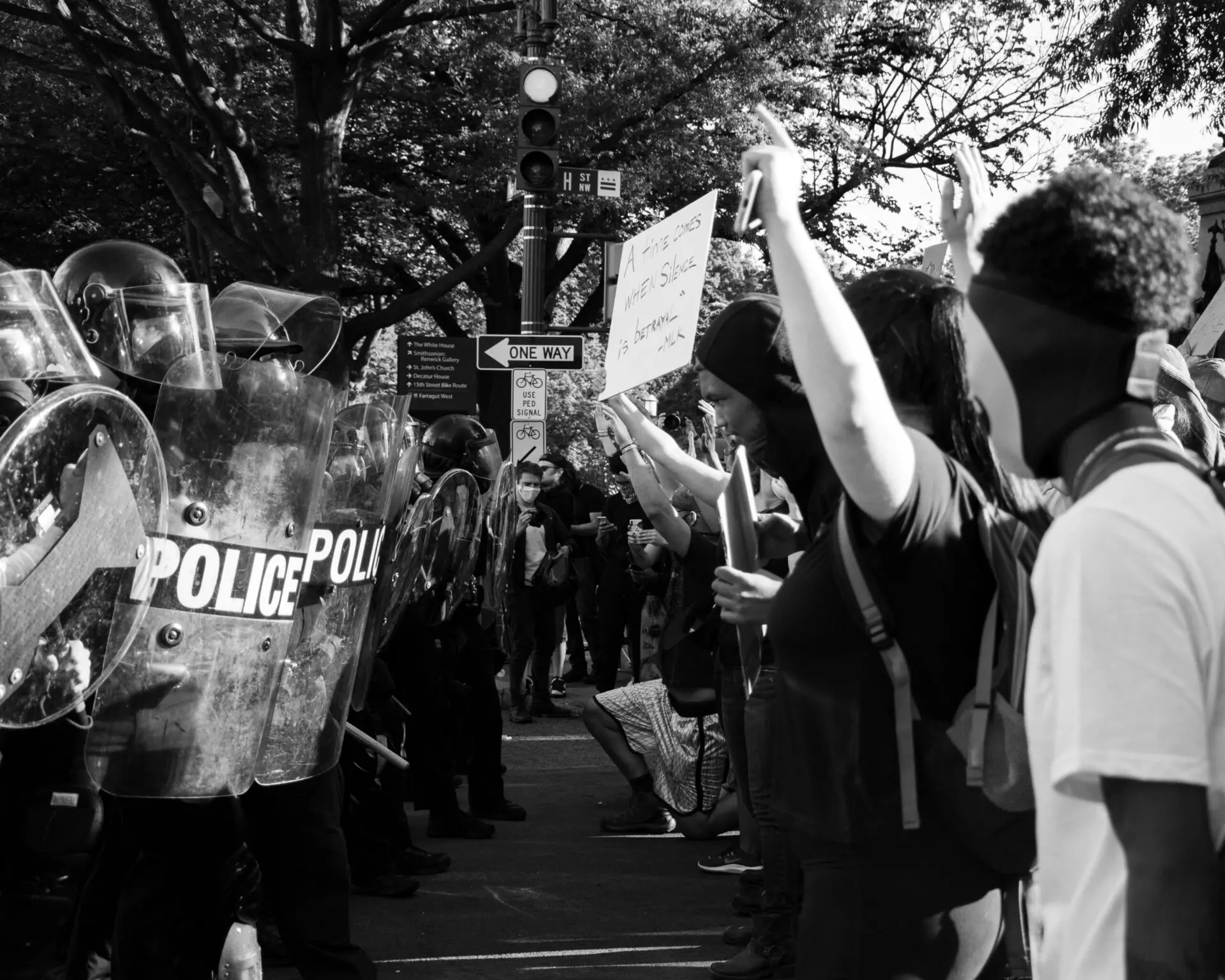 A group of people holding signs.
