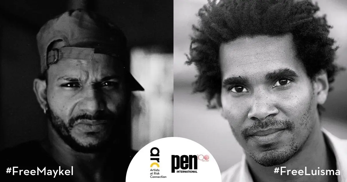 A split black-and-white photo shows two men looking at the camera. Text at the bottom reads #FreeMaykel and #FreeLuisma with PEN International and Artists at Risk Connection logos in the center.