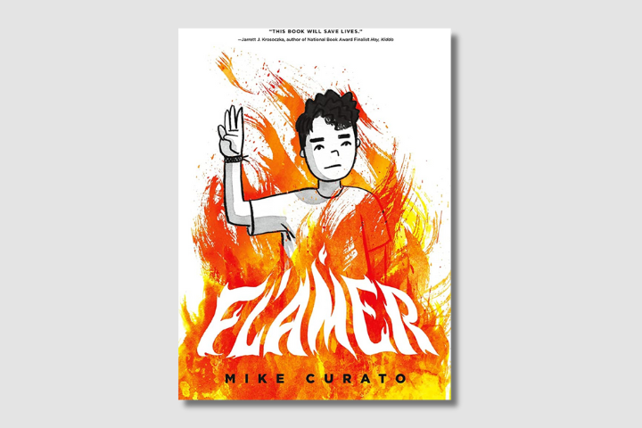 Book cover for Flamer by Mike Curato. An illustrated boy in black and white raises his right hand, surrounded by orange and yellow flames. The book title appears in white across the flames.
