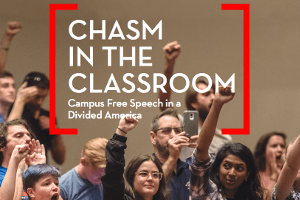 A group of diverse students in a classroom, some with raised fists, actively participate in a discussion on campus free speech. Text on the image reads, Chasm in the Classroom: Campus Free Speech in a Divided America.