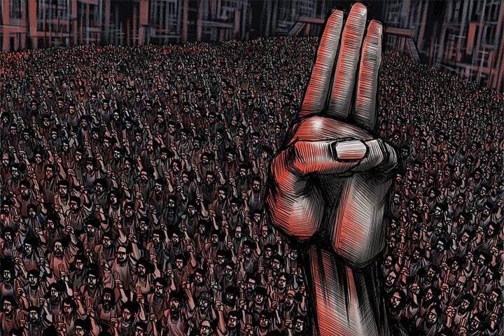 Illustrated image of a large crowd raising three-finger salutes, reminiscent of the Myanmar 2021 coup. The scene is in red and black tones, evoking a sense of protest or resistance. In the foreground, a close-up hand prominently displays the salute against buildings in the background.
