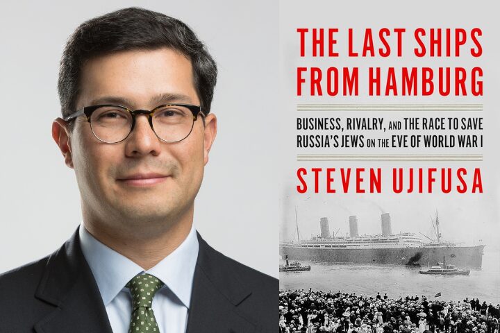 A man with glasses and dark hair in a suit smiles slightly. Beside him is a book cover titled The Last Ships From Hamburg by Steven Ujifusa. The cover features an image of a ship and text about saving Russias Jews before World War I.