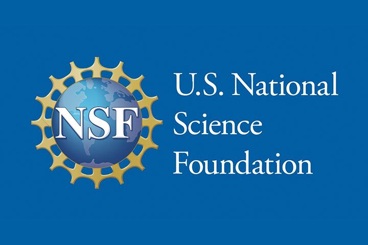 The logo of the U.S. National Science Foundation highlights the acronym NSF in white letters inside a blue globe, encircled by a gold gear-like frame. It represents the organizations commitment to science without censorship, with U.S. National Science Foundation displayed proudly on a blue background.