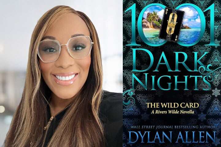 A person with long hair and glasses smiles, alongside the cover of the book 1001 Dark Nights: The Wild Card, A Rivers Wilde Novella by Dylan Allen, featuring an island scene with a tarot card on it.