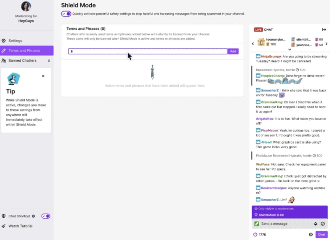 Screenshot of Twitch’s Shield Mode settings. The Terms and Phrases section lets users add banned words. On the right, a live chat shows messages from various users. Left menu displays Shield Mode features and tips.