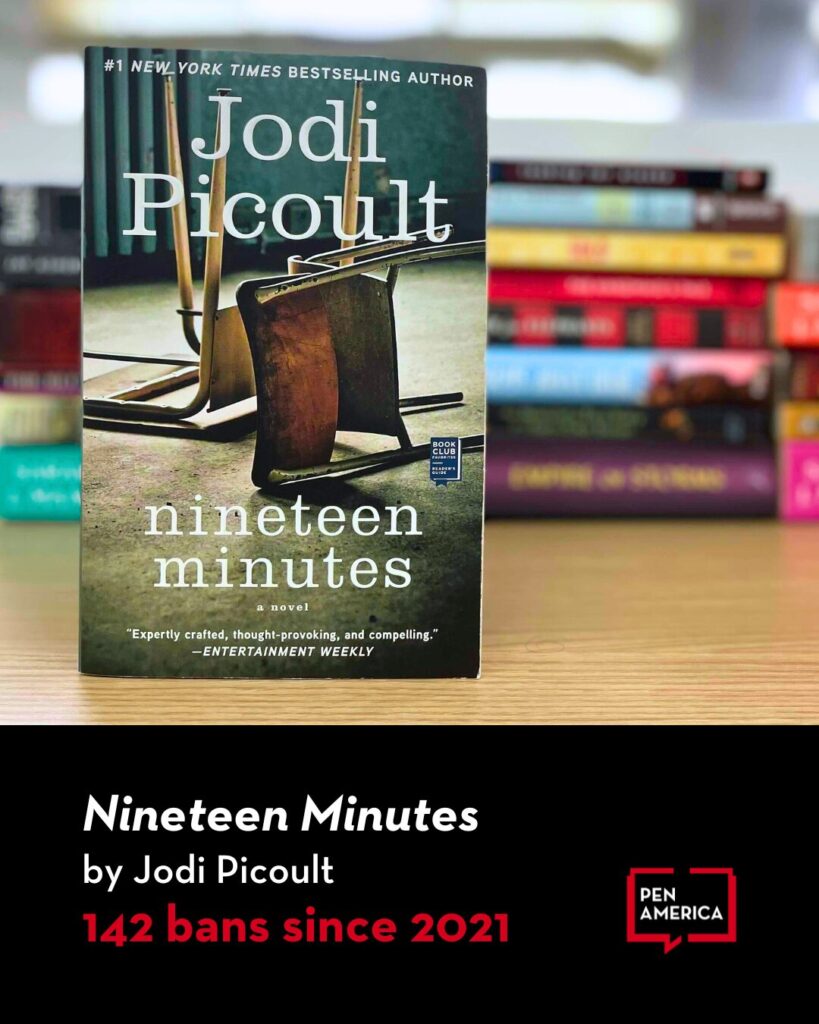A copy of Nineteen Minutes by Jodi Picoult is displayed standing on a table, with blurred books in the background. Text notes the book has faced 142 bans since 2021, according to PEN America.