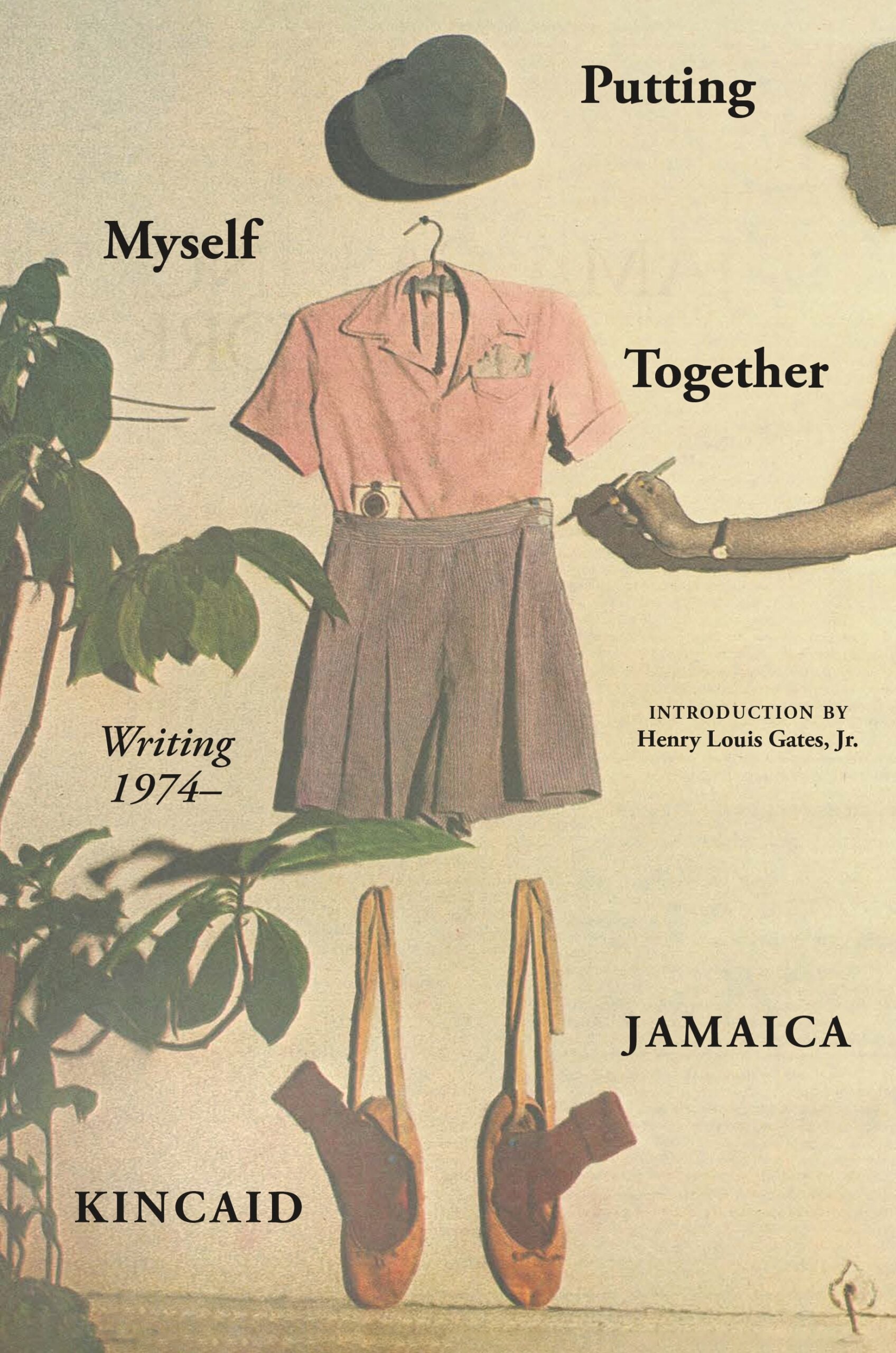 A hat, pink blouse, striped skirt, and red shoes are arranged on a wall as if worn, with the book title Putting Myself Together: Writing 1974 and author Jamaica Kincaid overlaid in black text.