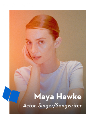 A woman with reddish hair pulled back, wearing a light-colored top, rests her face on her hand and looks at the camera. Text reads: “2026 Gala Presenter. Maya Hawke, Actor, Singer/Songwriter.”.
