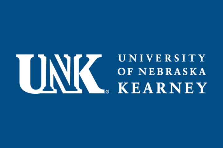 White text on a blue background reads UNK in large letters and University of Nebraska Kearney in smaller letters to the right. This is the logo for the University of Nebraska at Kearney.