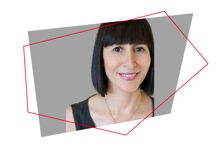 A woman with straight black hair and bangs smiles at the camera, wearing a sleeveless black top and necklace. The background is gray with overlapping abstract red and gray shapes.