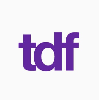 Bold purple lowercase letters tdf, often associated with creative literary festival sponsors, centered on a plain white background.